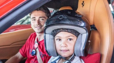 Leclerc gives driving lessons... to a six-year-old boy!