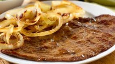 Steak with onions. Cuban recipe