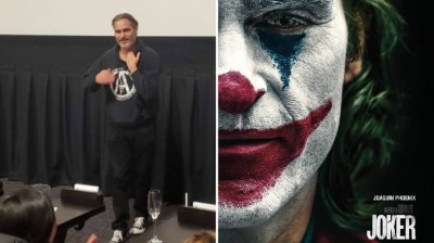 Joaquin Phoenix sneaks into a movie theater during Joker